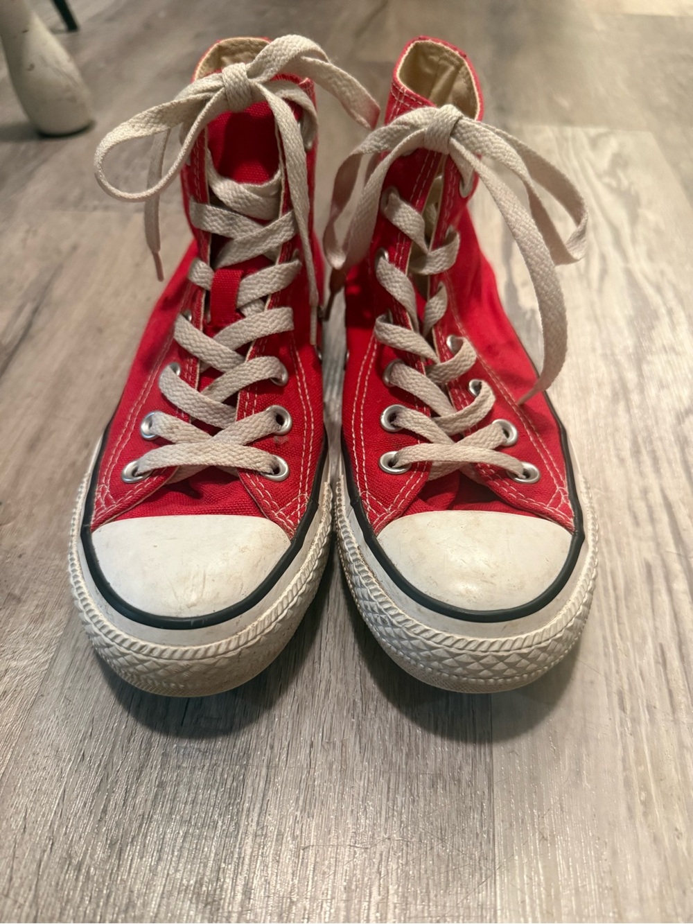 Red High-Top Converse Sneakers
